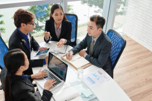 Business people discussing on hiring plans.